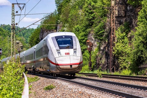 InterCityExpress ICE en route on the winding railway line of the Geislinger Steige. Landscape on
