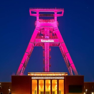 Illuminated headframe of the German Mining Museum at Extraschicht, Bochum, Ruhr area, North
