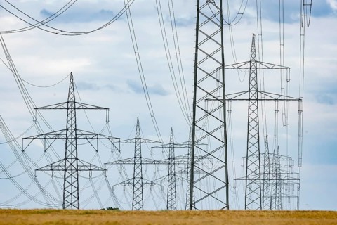 Many high-voltage power lines and lattice towers in the district of Ludwigsburg near Besigheim,