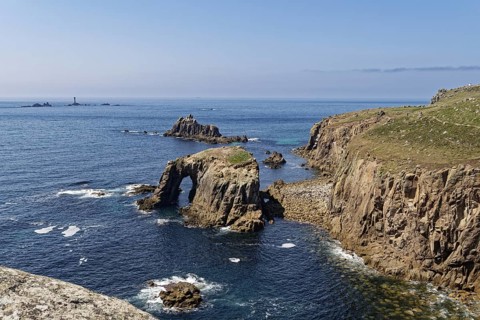 Rock formation and rock gate off the west coast of England in the Atlantic Ocean. Land's End, the