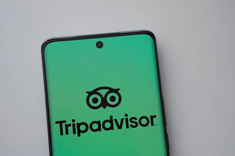 Dhaka, Bangladesh- 22 June 2025: The logo of the Tripadvisor is displayed on a smartphone screen