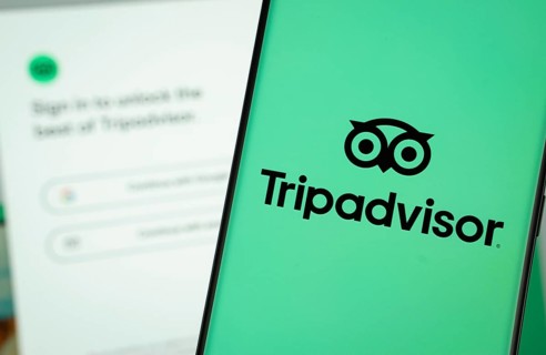 Dhaka, Bangladesh- 22 June 2025: Tripadvisor logo is displayed on a smartphone screen, with the