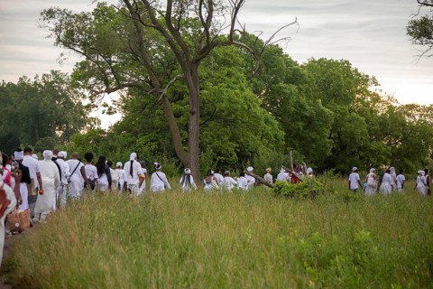 Detroit, Michigan - African-Americans gather on the banks of the Detroit River to commemorate
