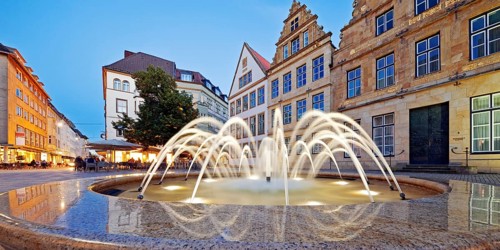 Old market with fountain and town houses in the evening, Bielefeld, East Westphalia-Lippe, North