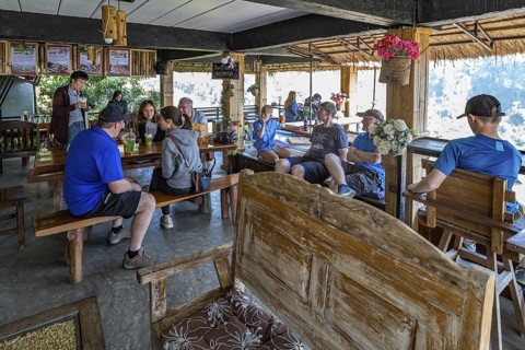 Stairs lead down to the Doi Phamee coffee shop and restaurant in Mae Sai district of Chiang Rai,
