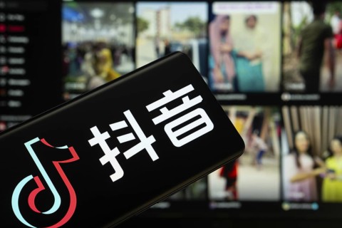 Dhaka, Bangladesh - 18 March 2025: The logo of the tiktok is displayed on a smartphone screen, and