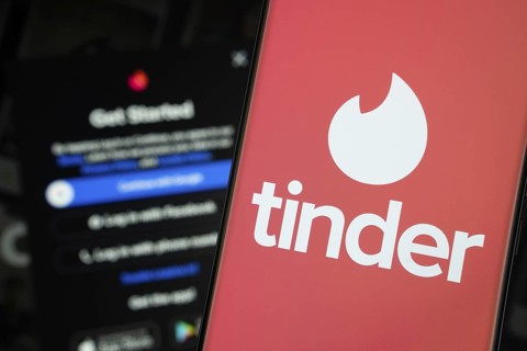 Dhaka, Bangladesh- 18 March 2025: tinder logo is displayed on a smartphone screen, with the tinder