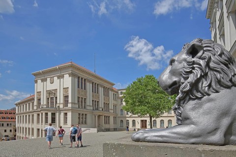 Head of lion figure and historical Melanchtonianum, palace, modern art, sculpture, lion head, lion,
