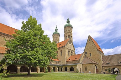 Late Romanesque UNESCO Cathedral of St Peter and St Paul with twin towers, inner courtyard with