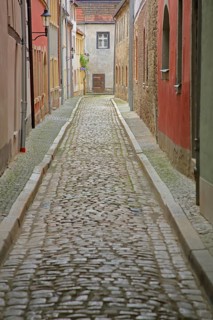 Narrow alley with houses, long narrow, alleyway with cobblestones and vanishing point, Judengasse,