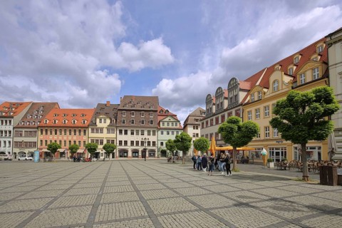Houses and pedestrians at the market, Saale, Naumburg, Saxony-Anhalt, Germany
