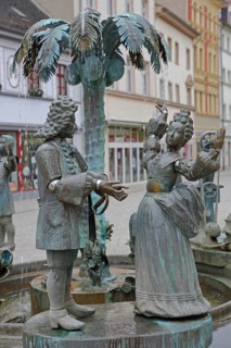 City fountain by Bonifatius Stirnberg 2000, bronze sculptures on the historical city history with
