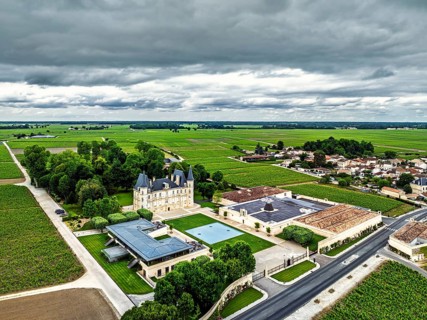Chateau Pichon Longueville Baron Vineyard and grape fields around Pauillac from a drone, Bordeaux,