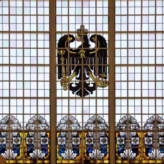 A stained glass window in the railway station with an imperial eagle is a reminder of the imperial
