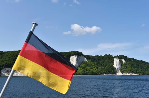 German flag on the Königsstuhl chalk cliff on Rügen, Mecklenburg-Western Pomerania, Germany