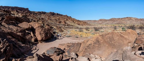 Tourists visiting the rock engravings of Twyfelfontein, Twyfelfontein, Kunene, Namibia