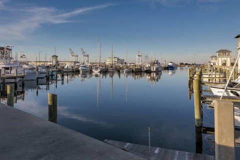 Sailboats and fishing boats docked in the Small Craft Harbor at Gulfport, Mississippi, USA