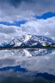 Mountain lake with alpine panorama, snow pond Finkenberg, Penken, Mayrhofen, Zillertal, Tyrol,