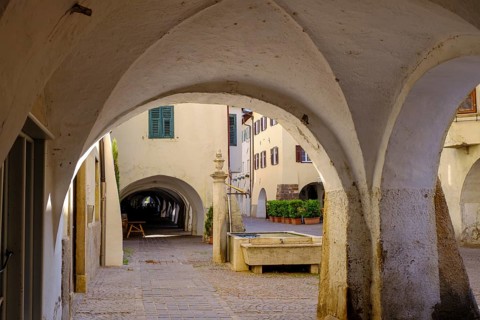 Arcades, archways in the old town centre, Neumarkt, Unteretsch, South Tyrol, Italy