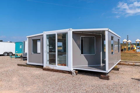 Foldable tiny house container kit home partially unfolded at Botel Campground near Savannah,