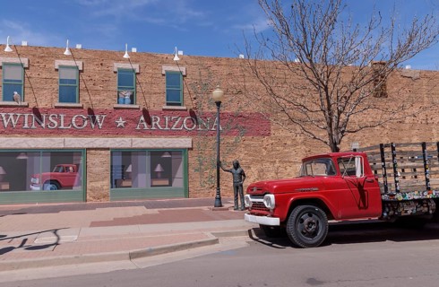 Statue of a man Standin' on a Corner in Winslow Arizona as sung in the classic Glenn Frey and