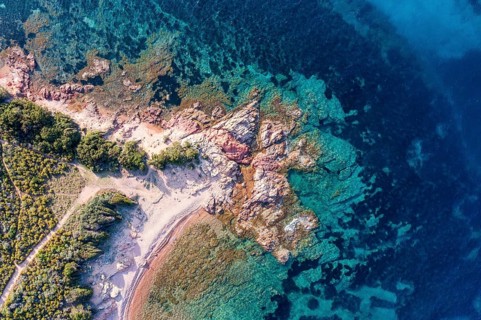 Aerial view, colourful rocks in the sea, rocky bay, Corsica, France