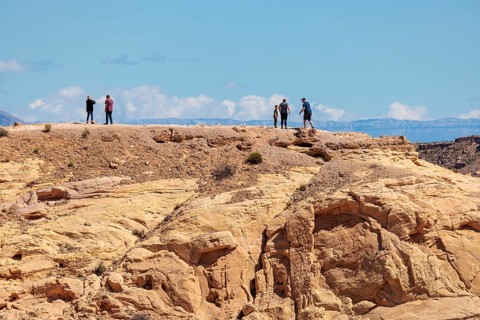 Hikers on the trail to an overlook at the end of Fire Canyon Road at Valley of Fire State Park near