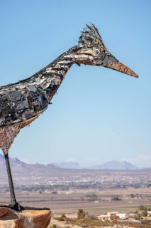 Giant Recycled Roadrunner statue made entirely from discarded materials by artist Olin Calk at an