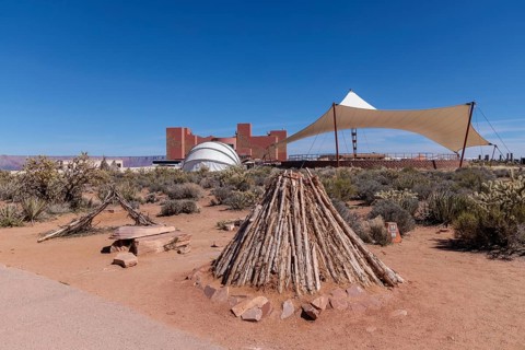 Cultural exhibits and shade structures at the Eagle Point overlook area of Grand Canyon West near