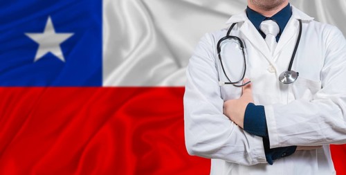 Male doctor with stethoscope on Chile flag. Doctor holding stethoscope on Chile flag