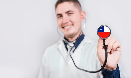 Doctor showing stethoscope with Chile flag. Chile national healthcare concept