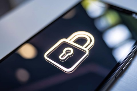 Close-up of smartphone screen with security lock icon symbolizing digital privacy and data