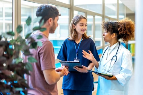 Medical professionals collaborating, sharing expertise, and providing optimal patient care in a