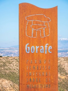 Signpost at the Gorafe megalithic park, Gorafe desert, Andalusia, Spain