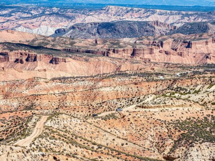 Gravel roads in the desert, 4x4 car, colorful canyons and gorges, Gorafe Desert, UNESCO Granada