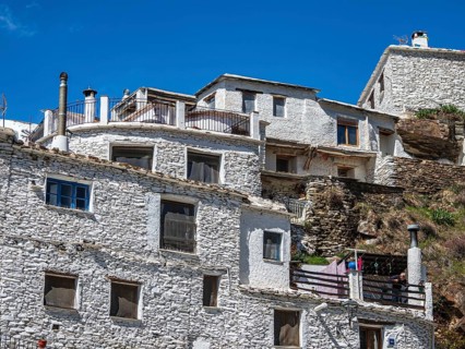 Whitewashed facade of a tradtional house, village Trevelez, one of the whitewashed villages on the