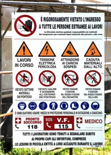 Construction site protection with prohibition signs in Italy