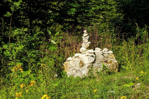 Cairn to mark the edge of the path, near the Schertelshöhle cave, Swabian Alb, Germany