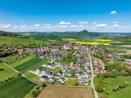 Aerial view of the municipality of Weiterdingen in Hegau, on the horizon the Hohenhewen, district