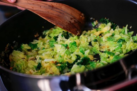 Swabian cuisine, preparation savoy cabbage, wild boar medallions with savoy cabbage cakes, sautéing