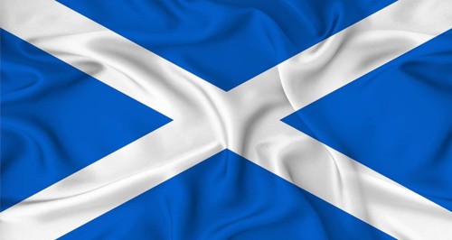 Realistic Scotland flag waving. Close up of flag of Scotland with cloth texture