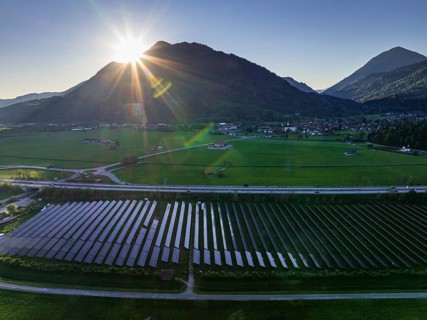 Aerial view, solar system, photovoltaics, morning light, backlight, mountains, sunny, spring, near