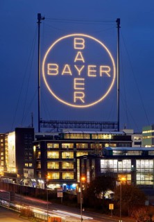 Bayer cross in the blue hour on the premises of Bayer AG, Leverkusen, Bergisches Land, North