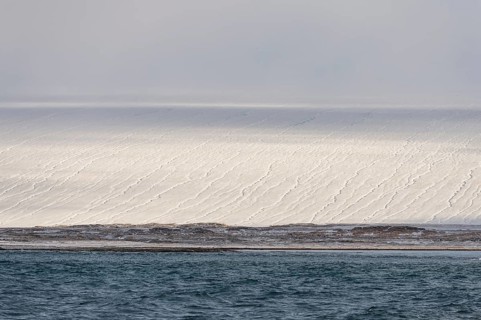 Glacier, glaciated island of Kvitøya, Svalbard and Jan Mayen archipelago, Norway