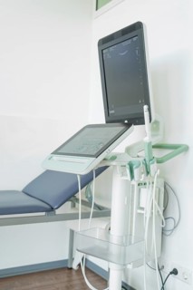Modern ultrasound machine in a medical environment with monitor and control unit, Urology, Germany