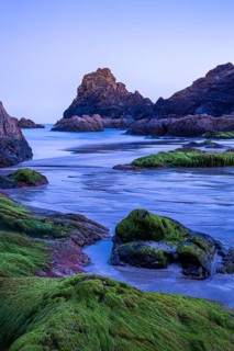 Rocks in Kynance Cove. Evening, blue hour. Long exposure. Kynance Cove, Lizard Peninsula, Cornwall,