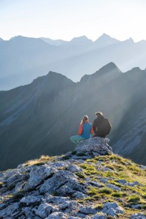 Hiker enjoying the mountain panorama in the morning, Venedigergruppe, Hohe Tauern, Austria