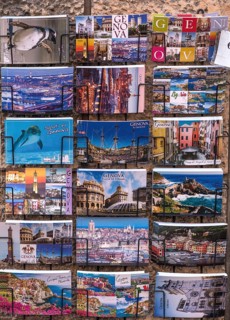 Colourful postcards on a stand, old town, Genoa
