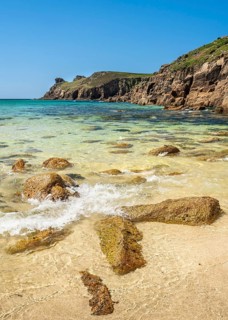 Sandy beach beach and rocks in Nanjizal Bay or Nanjizal Beach. St Just, Penzance, Cornwall,
