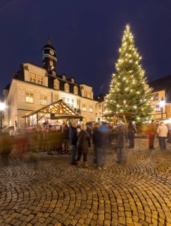 Christmas market in front of the town hall, Christmas tree on the market square Schwarzenberg,